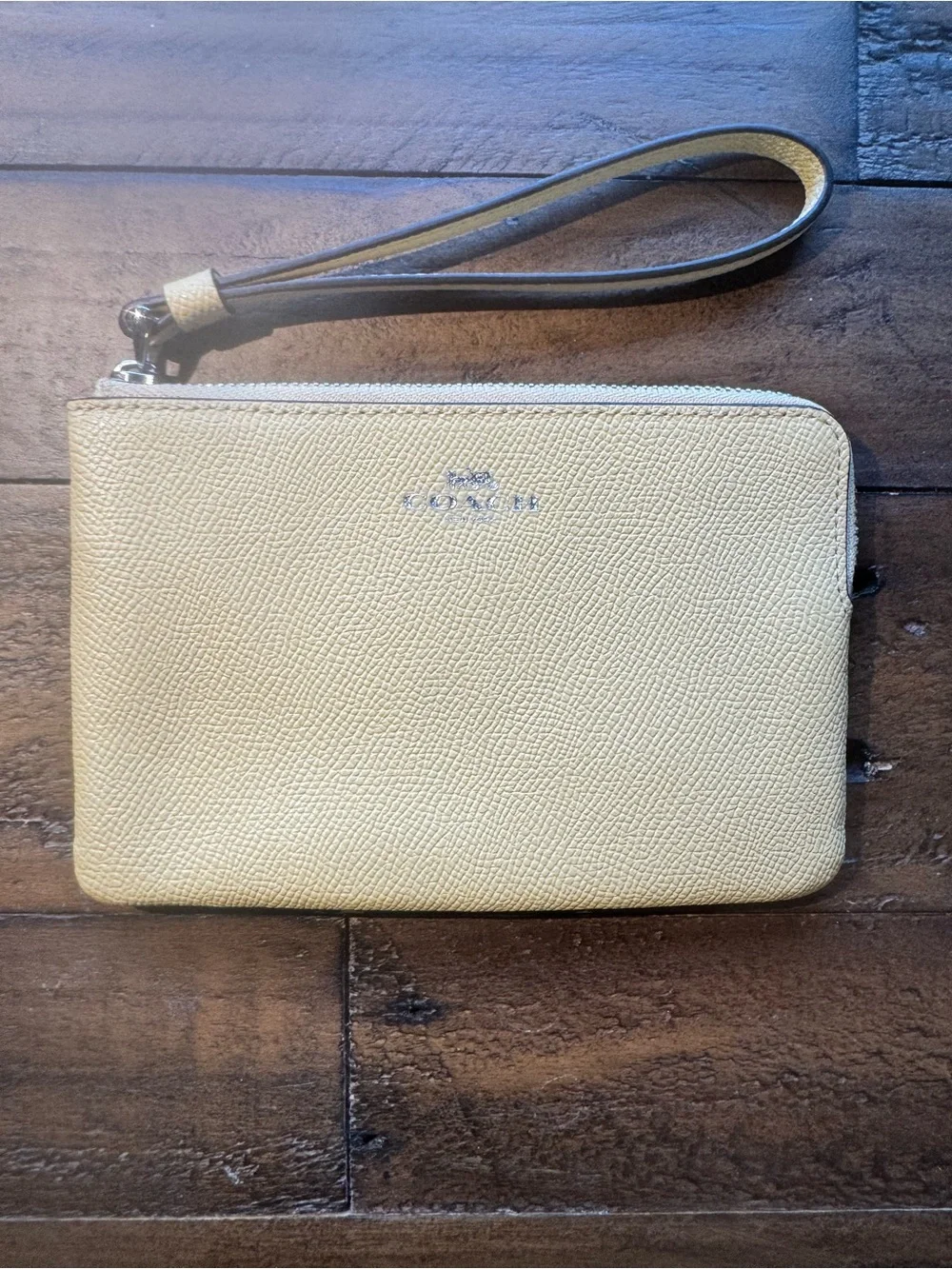 Coach Pale Yellow Pebbled Leather Wristlet